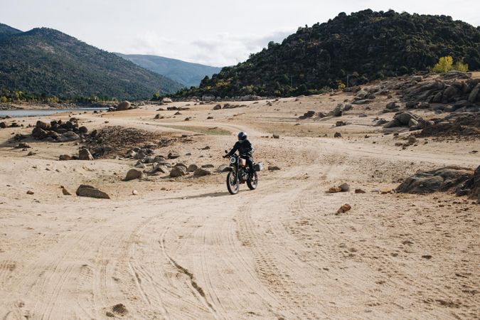 Person riding motorcycle off-road