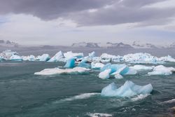 Iceland, Jokulsarlon Lagoon, Turquoise icebergs floating in Glacier Lagoon on Iceland.