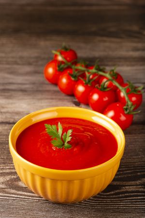 Delicious homemade tomato soup in bowl.