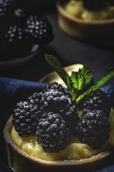 Homemade small cake with blackberries