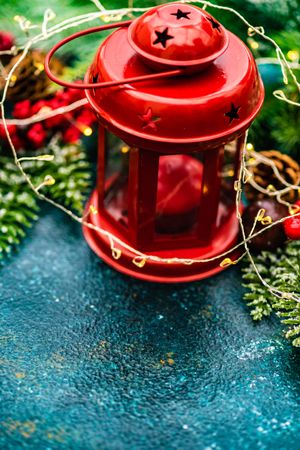 Ornamental Christmas lantern on green table