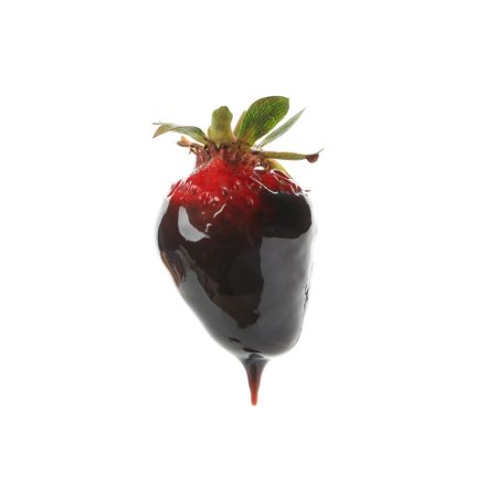 Chocolate fondue. Strawberry in chocolate sauce isolated on plain background
