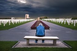 Man contemplating in a cemetery