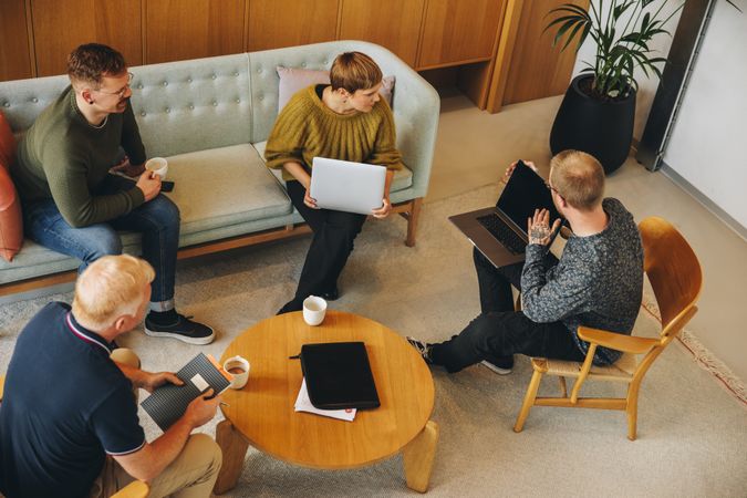 Group of business people having a brainstorming meeting