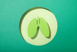 Green circle with green lungs