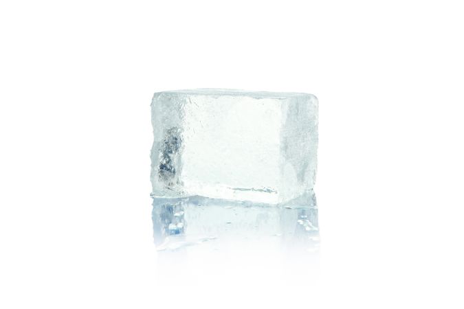 One ice cube on plain background
