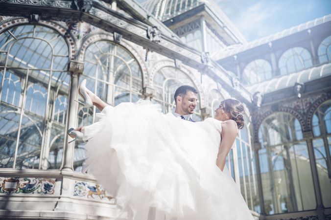 Newly weds having fun near vintage building