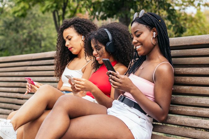 Black Friends Enjoying Summer Together and listening to music
