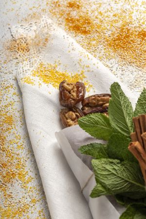 Dates fruits with walnuts, mint and cinnamon for Ramadan