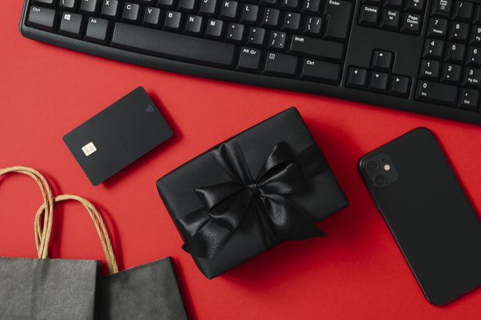 Sale concept with gift box on red background
