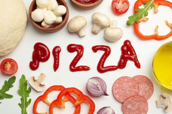 Inscription Pizza and ingredients for cooking on blank background