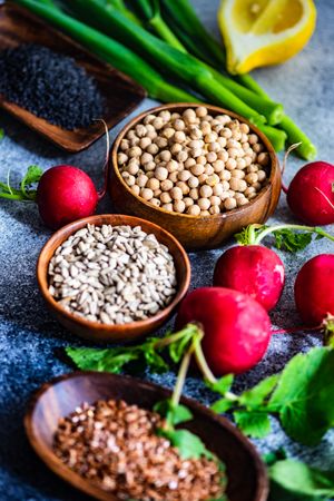 Fresh ingredients of grains, radishes and lemon slices