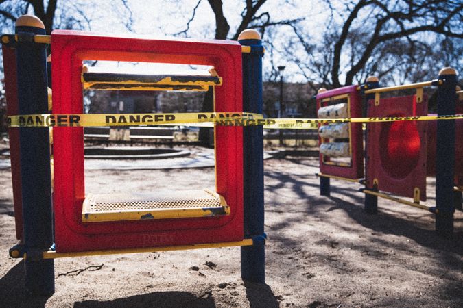MONTREAL, QUEBEC, CANADA – March 31 2020- Playground closed down with 'danger' yellow tape