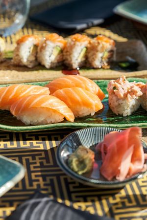 Delicious sushi rolls on plate