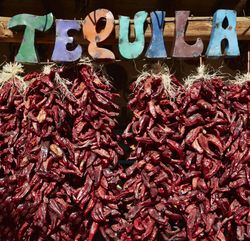 Chile peppers, are displayed outside the Casa Cristal Potter home-and-garden roadside 41Jwpb