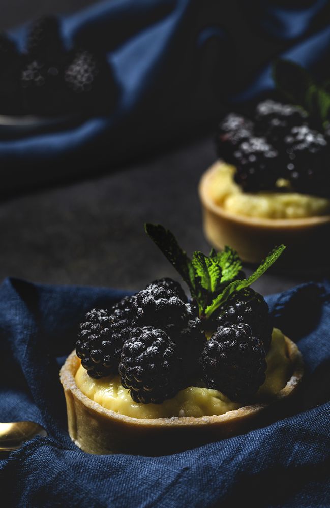 Homemade small cake with blackberries