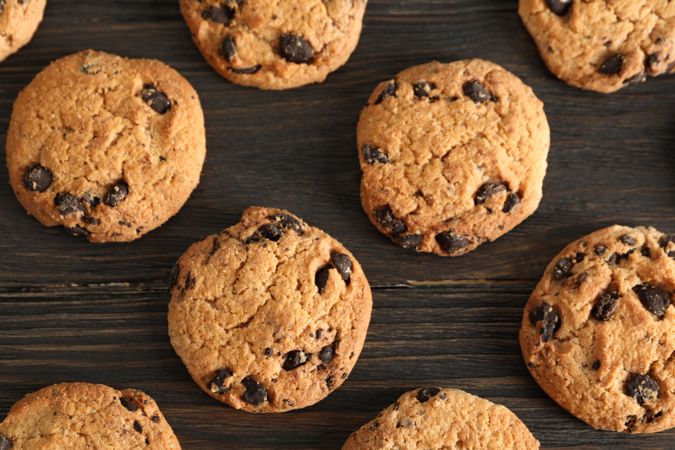 Chocolate chip cookies on wooden background. Top view