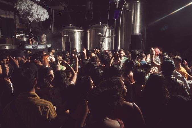 London, England, United Kingdom - Nov 9, 2022: Dense crowd in brewery at music festival