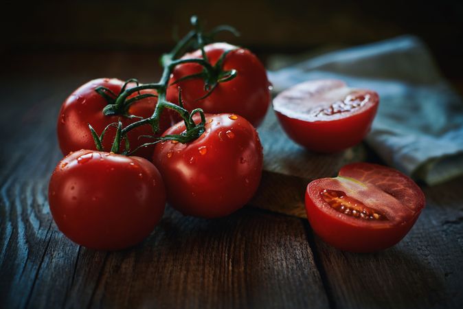 Fresh tomatoes on wooden table