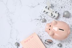 Concept of Christmas finance with piggy bank, space for text