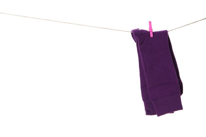 Concept of clothes for legs - socks, isolated on light background