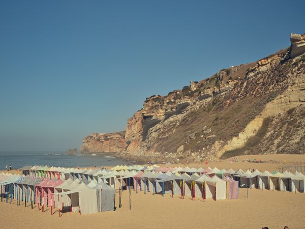 Beach with tents near sea