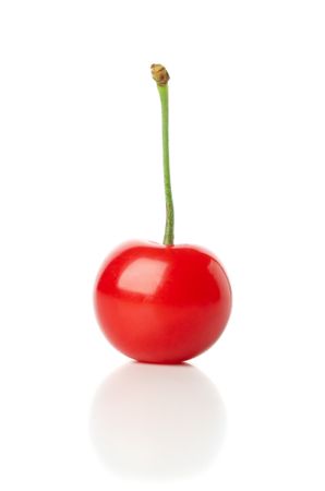 Fresh red cherry isolated on neutral background