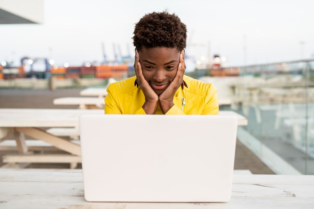 Female working on laptop at table