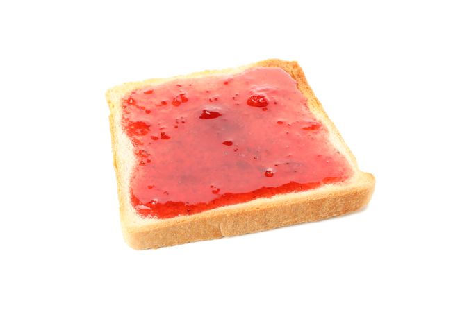 Toast with strawberry jam isolated on plain background