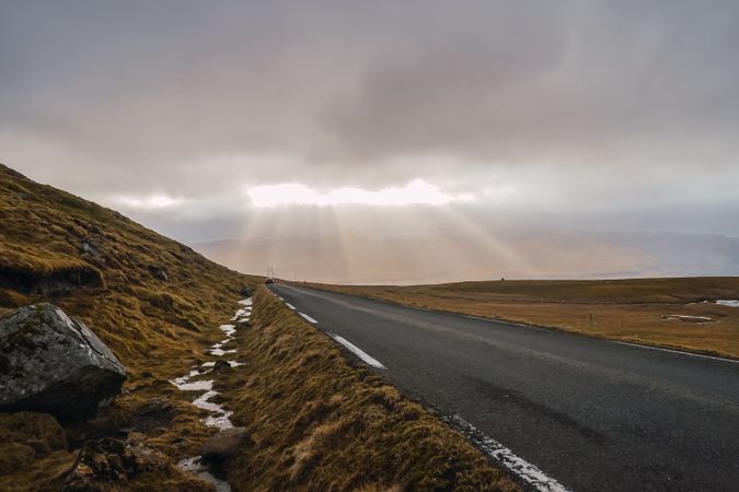 Winding road on hilly terrain