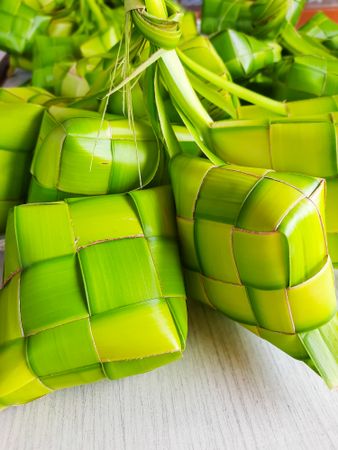 Ketupat is a natural rice container made from young coconut leaves for cooking rice