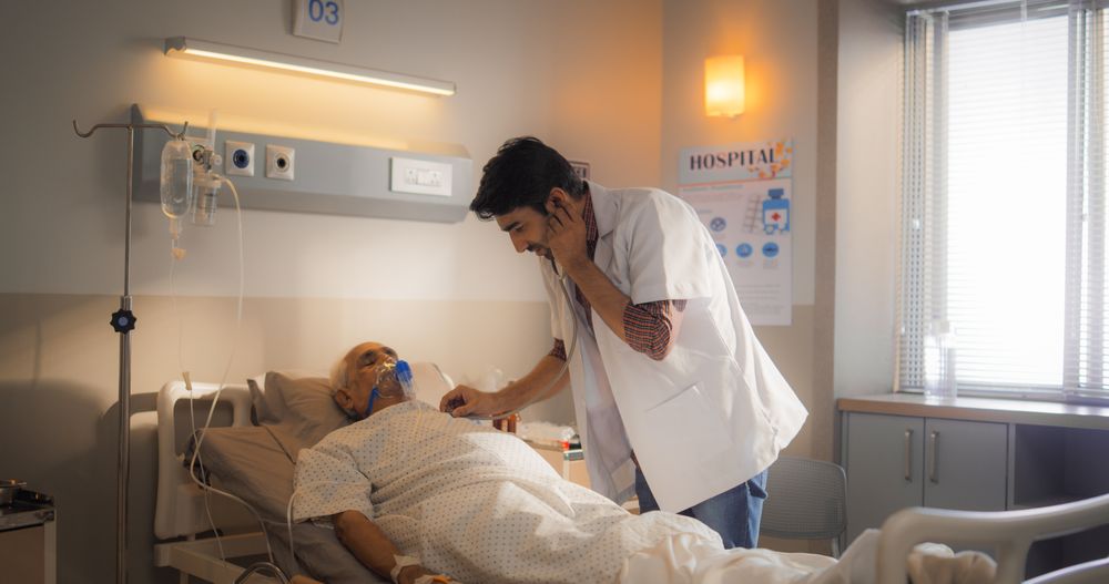 Nurse Checking Heart Rate of a Patient After Successful Surgery