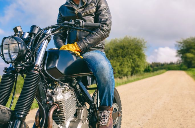 Man riding custom motorbike