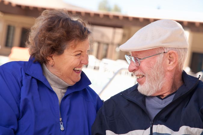 Happy Mature Adult Couple Bundled Up Outdoors