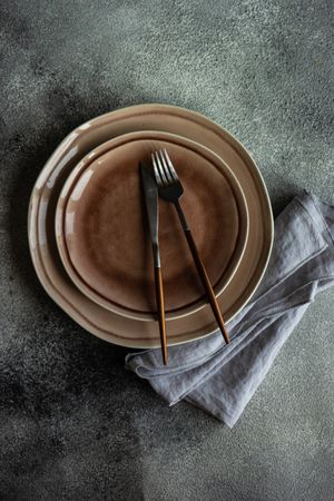 Top view of table setting with elegant ceramic plate