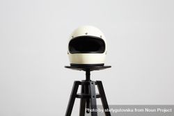 Motorcycle helmet on a stool 4AMqY4
