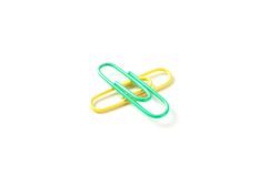 Color paper clips isolated on plain background