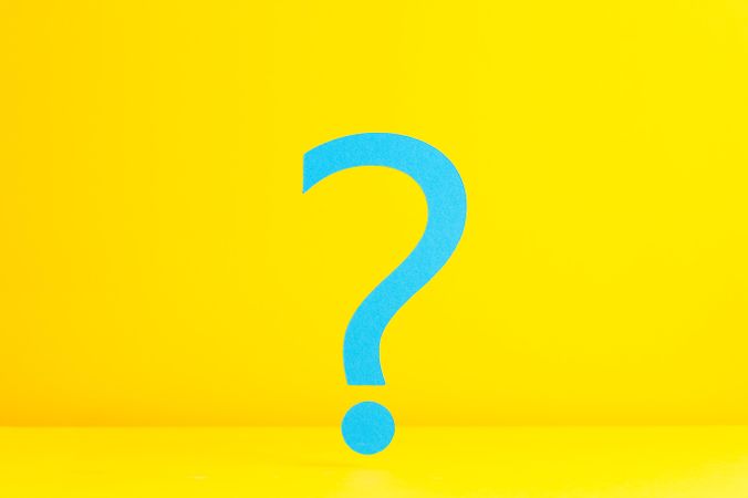 Blue question mark on yellow background