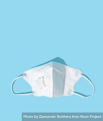 Respiratory or surgical face mask with baby blue background beyPGb