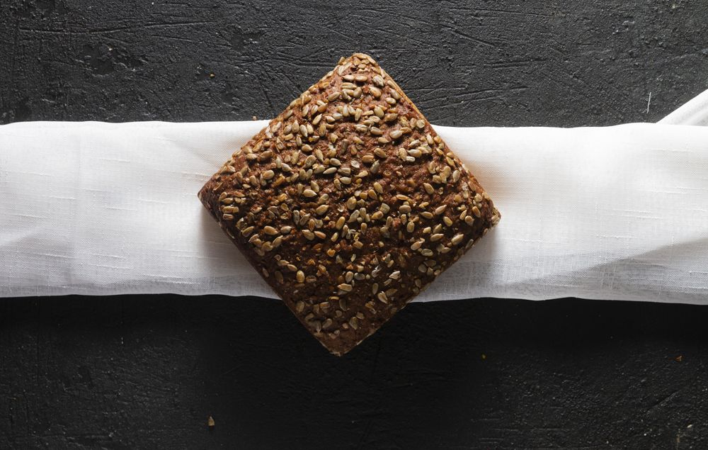 Loaf of bread with grains and poppy seeds