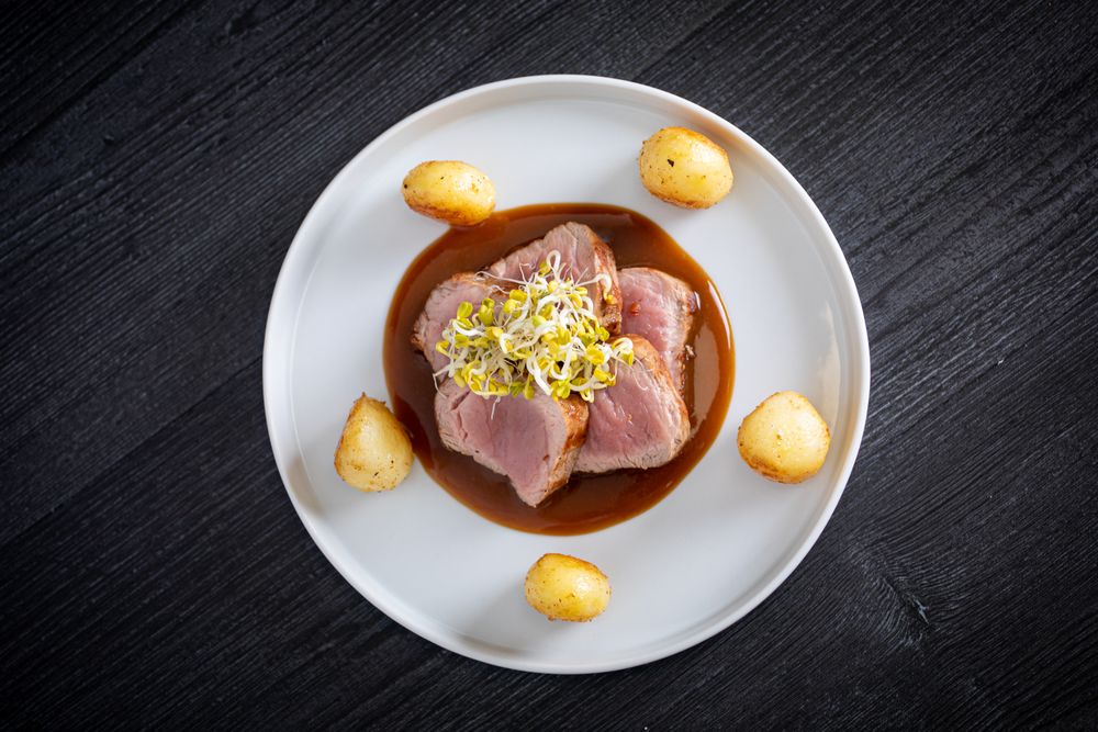 Duroc sirloin with orange ginger soy and potatoes
