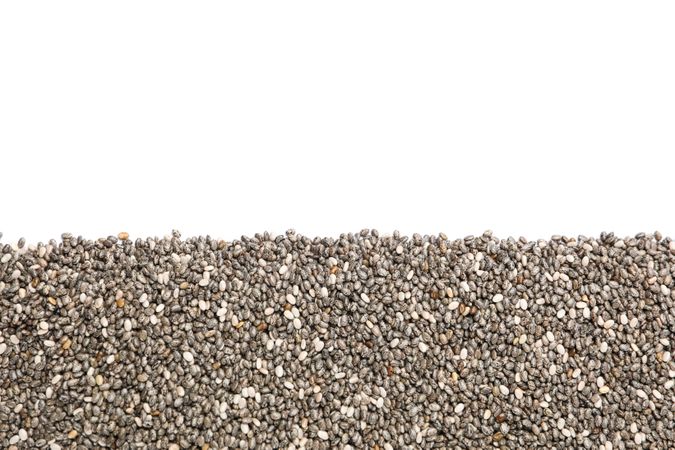 Chia seeds isolated on neutral background, top view