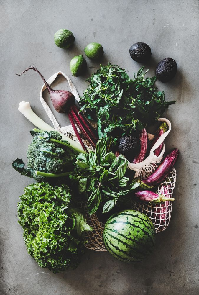 Fresh produce, top view, vertical composition with mesh bag, vertical composition