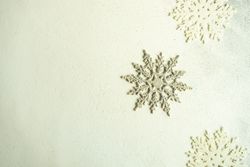 Top view of decorative snow flakes with copy space