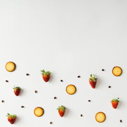 Coffee bean, cookie and strawberry pattern on light background
