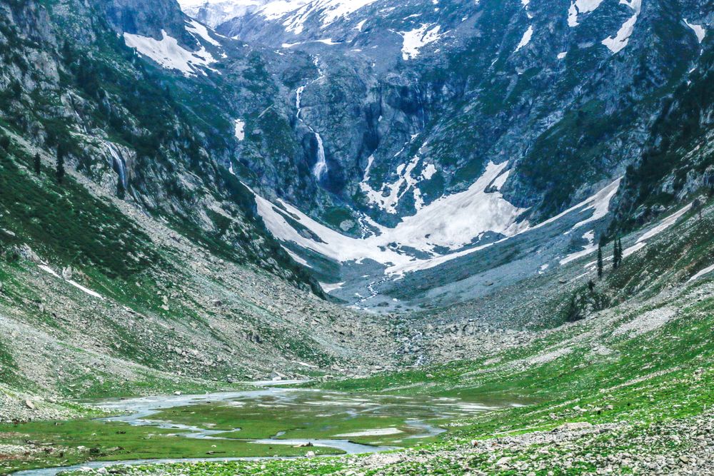Valley nestled in mountains in Pakistan