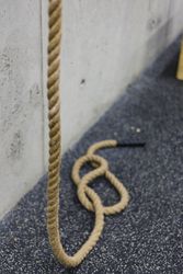 Rope hanging near wall in gym