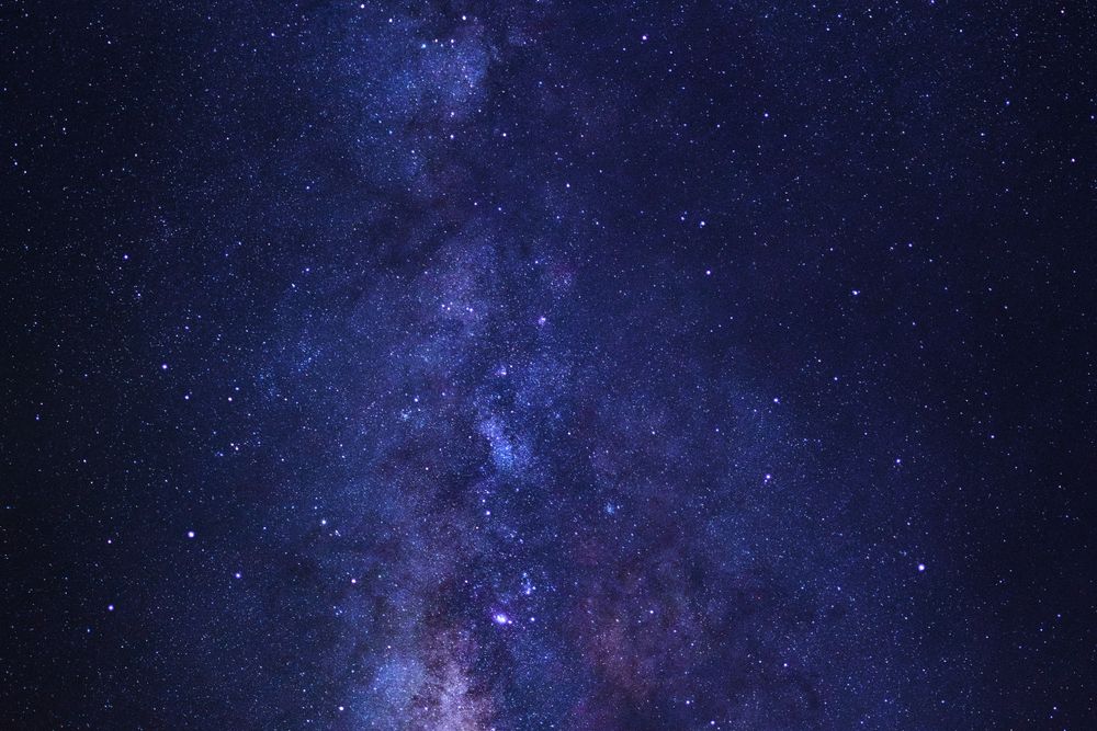 Starry night sky and milky way galaxy with stars and space dust in the universe
