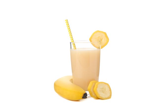 Banana juice isolated on blank background. Fresh fruit