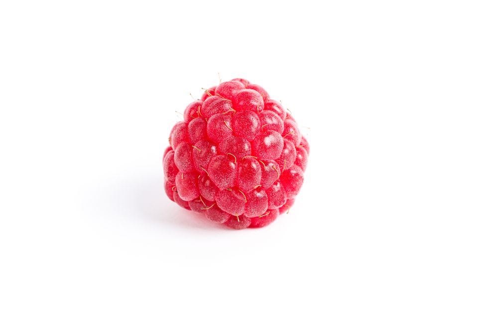 Fresh sweet raspberry isolated on blank background